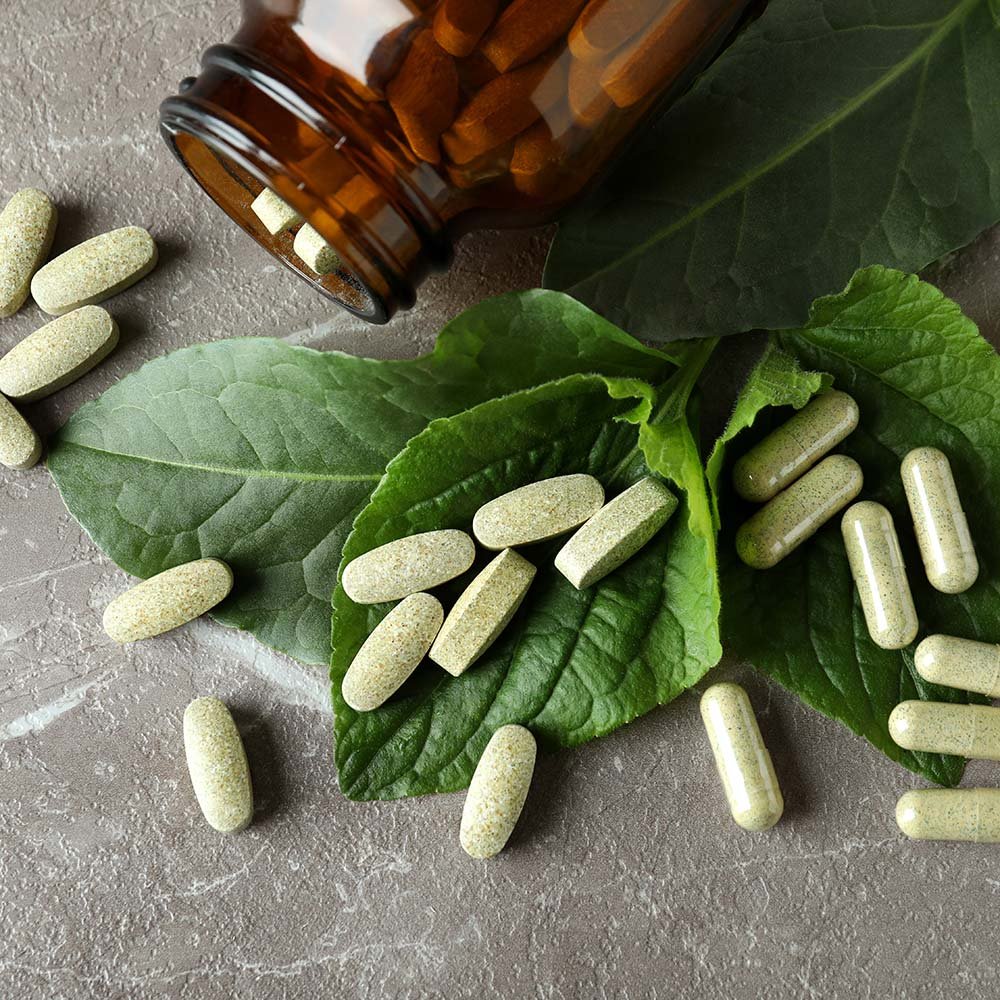 concept of herbal medicine pills on gray textured uj7837v.jpg